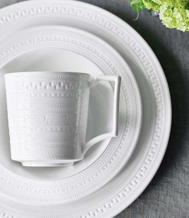 Intaglio Teacup and Saucer - Roomours