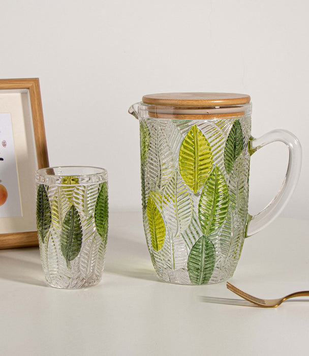 إبريق ليف زجاجي مزيّن بأوراق خضراء مع غطاء - 12.5×12.5×20 سم